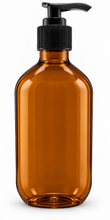 Load image into Gallery viewer, Amber PET pump bottle with black pump, filled with product